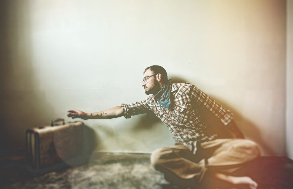 Reaching for a suitcase